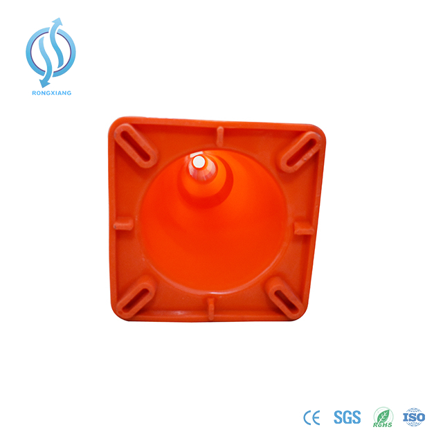 Durable Orange And White Traffic Cone on Road